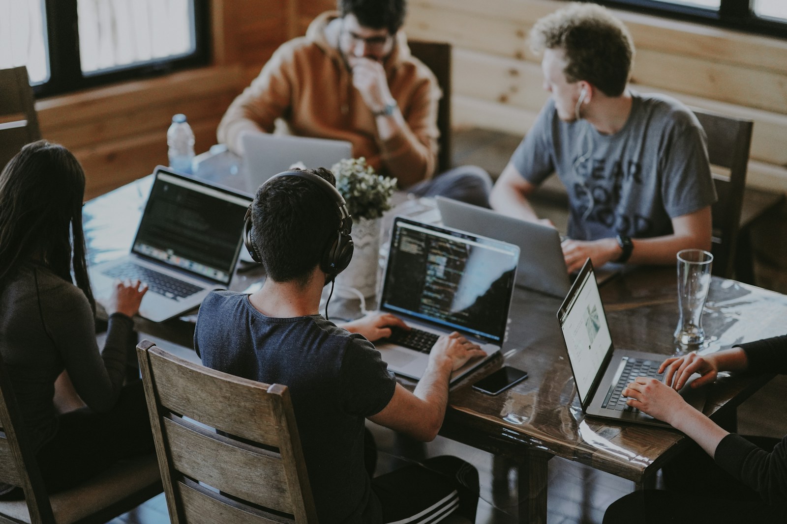 Team around a table during a campaign architecture sprint